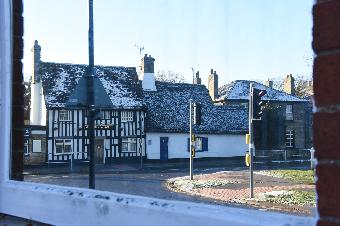 One pub through the window of another!